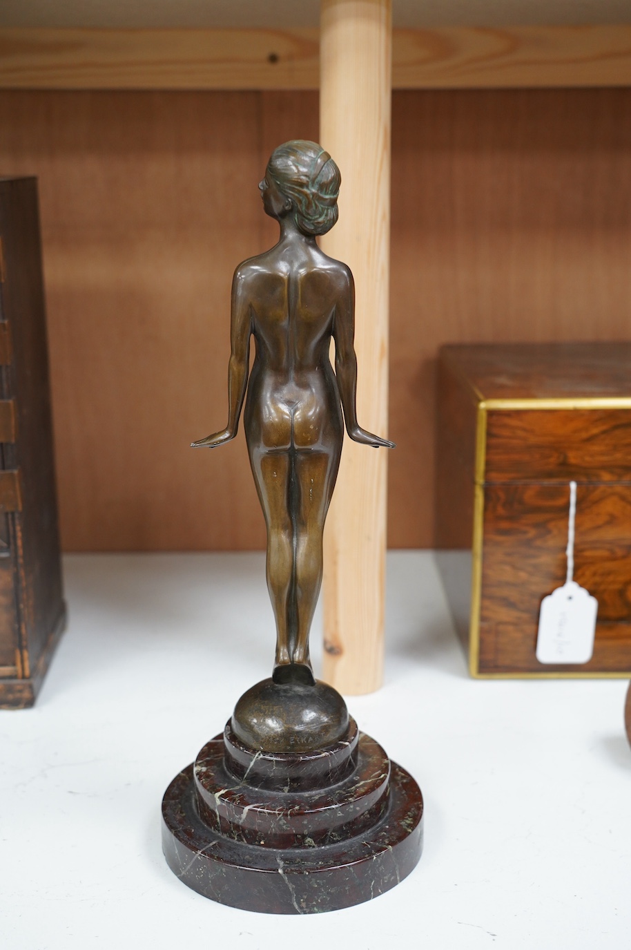 Lissy Eckart (German, 1891-1974), bronze, standing female nude, on marble base, 35cm. Condition - fair to good, chips to marble